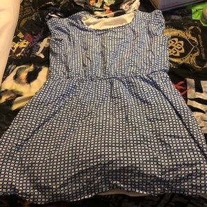 Blue and white checkered dress game brand